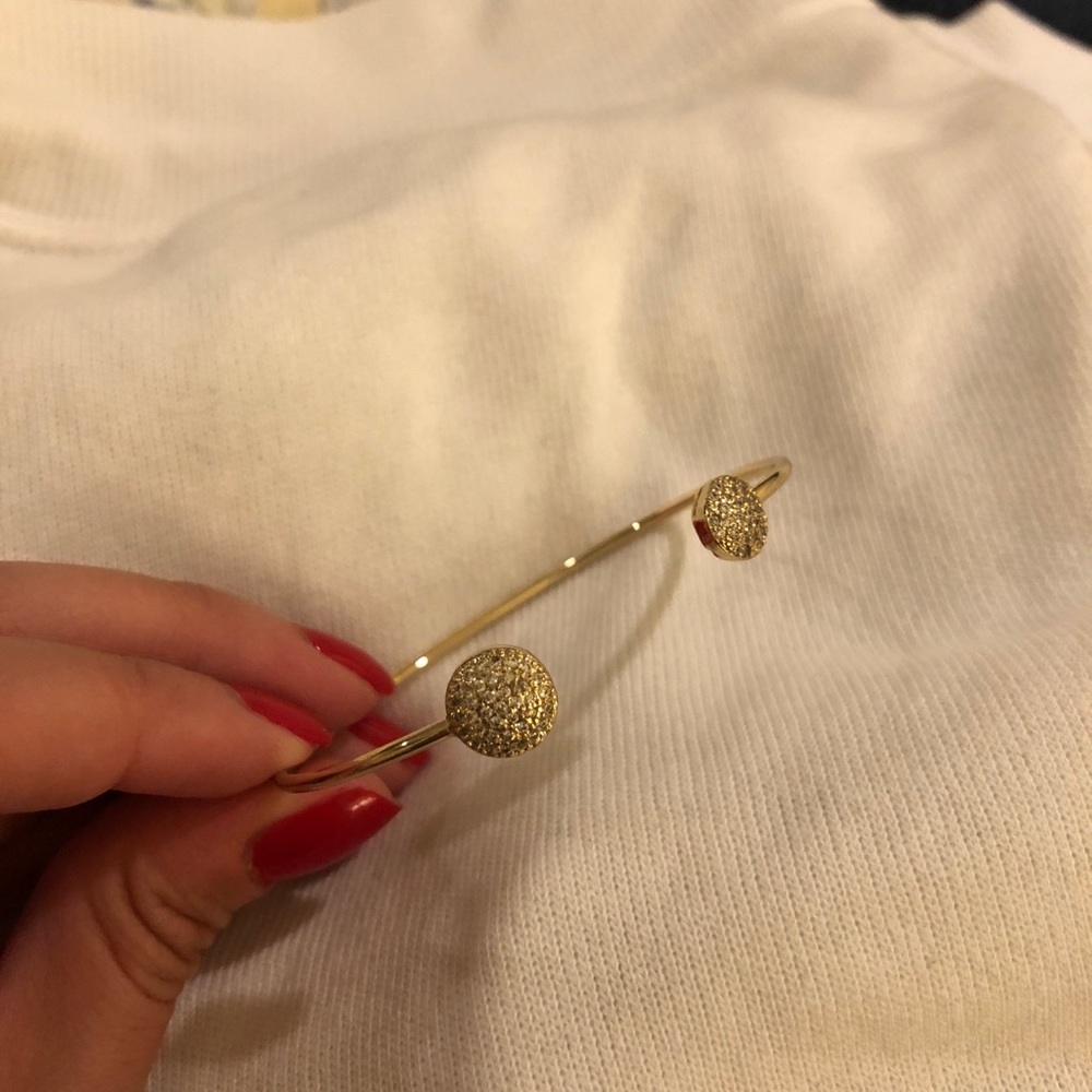 Gold bangle with crystal detail